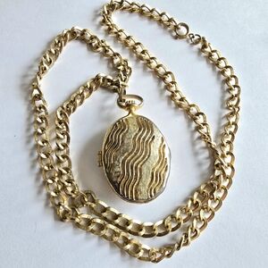 Vintage Kramer locket necklace gold tone oval Victorian revival style
